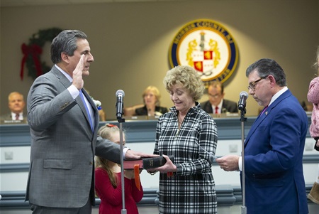 (l-r) Commissioner Stephen Shaw, his granddaughter, his wife, Cindy, and Sen. Anthony Bucco.
