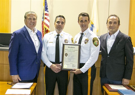 Commissioner Thomas Mastrangelo, Capt. Carlo Marucci, Chief Andrew Caggiano and Director Tayfun Selen.