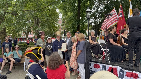 Group shot, in line from left to right is: Morristown Mayor Timothy Dougherty as Gen. Darcy, Wendy York, Michael Halbert as Ge. Lafayette, Deputy Director Stephen Shaw, Commissioners Christine Myers and John Krickus, Chuck Schwam and Carol Barkin.