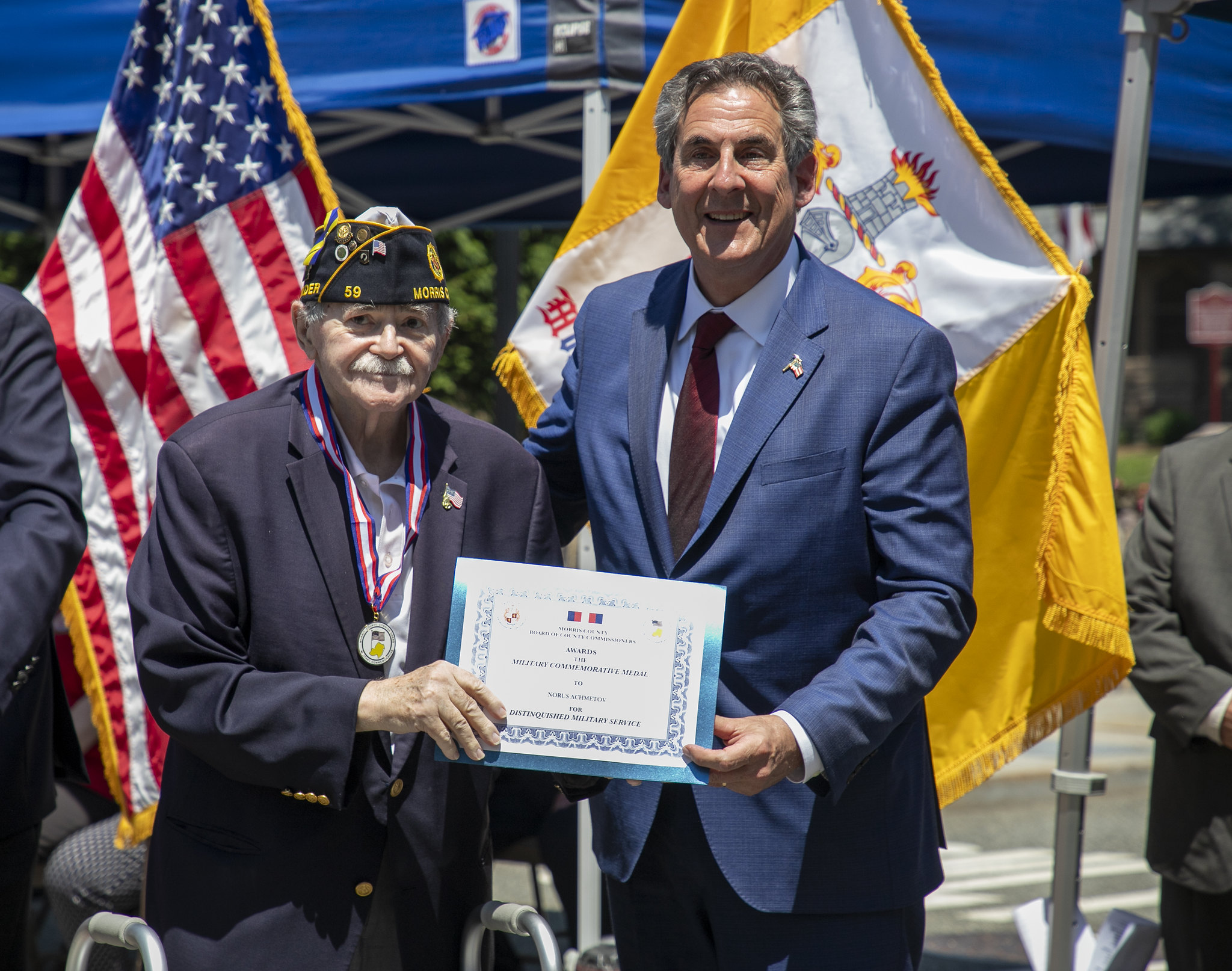 Veteran Norus Achmetov poses with Morris County Commissioner Director Stephen H. Shaw upon receiving his Morris County Distinguished Military Service Medal.
