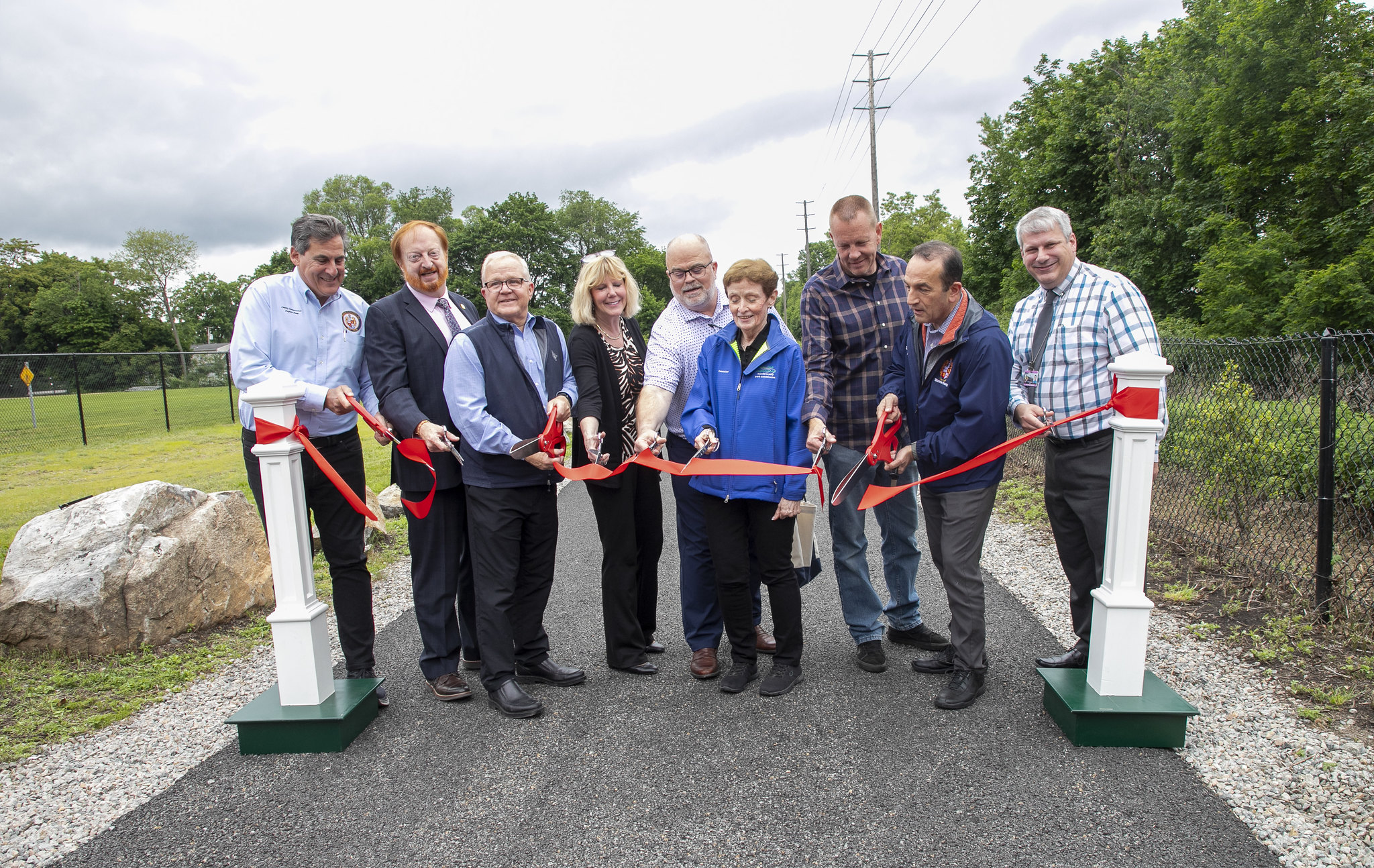 A ribbon cutting ceremony officially opened the Pompton Valley Rail Trail in May 2025. From left, Morris County Commissioner Deputy Director Stephen Shaw, who is also secretary of the North Jersey Transportation Planning Authority, Passaic County Commissioner John Bartlett, Morris County Commissioner and liaison to the Morris County Park Commission Doug Cabana, Pequannock Council members Melissa Florance-Lynch and David Kohle, Morris County Park Commissioner Betty Cass-Schmidt, Pequannock Mayor John Driesse, Morris County Commissioner Director Tayfun Selen, and Chris Vitz, Morris County Engineer and Director of the Department of Public Works.