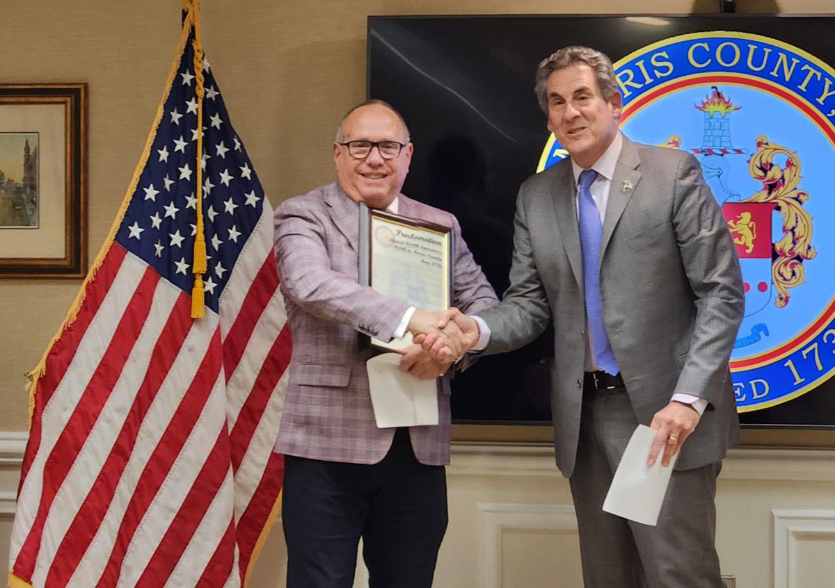 Victor DeVito, chair of the Morris County Mental Health Addictions Services Advisory Board (left) and Commissioner Director Stephen Shaw.