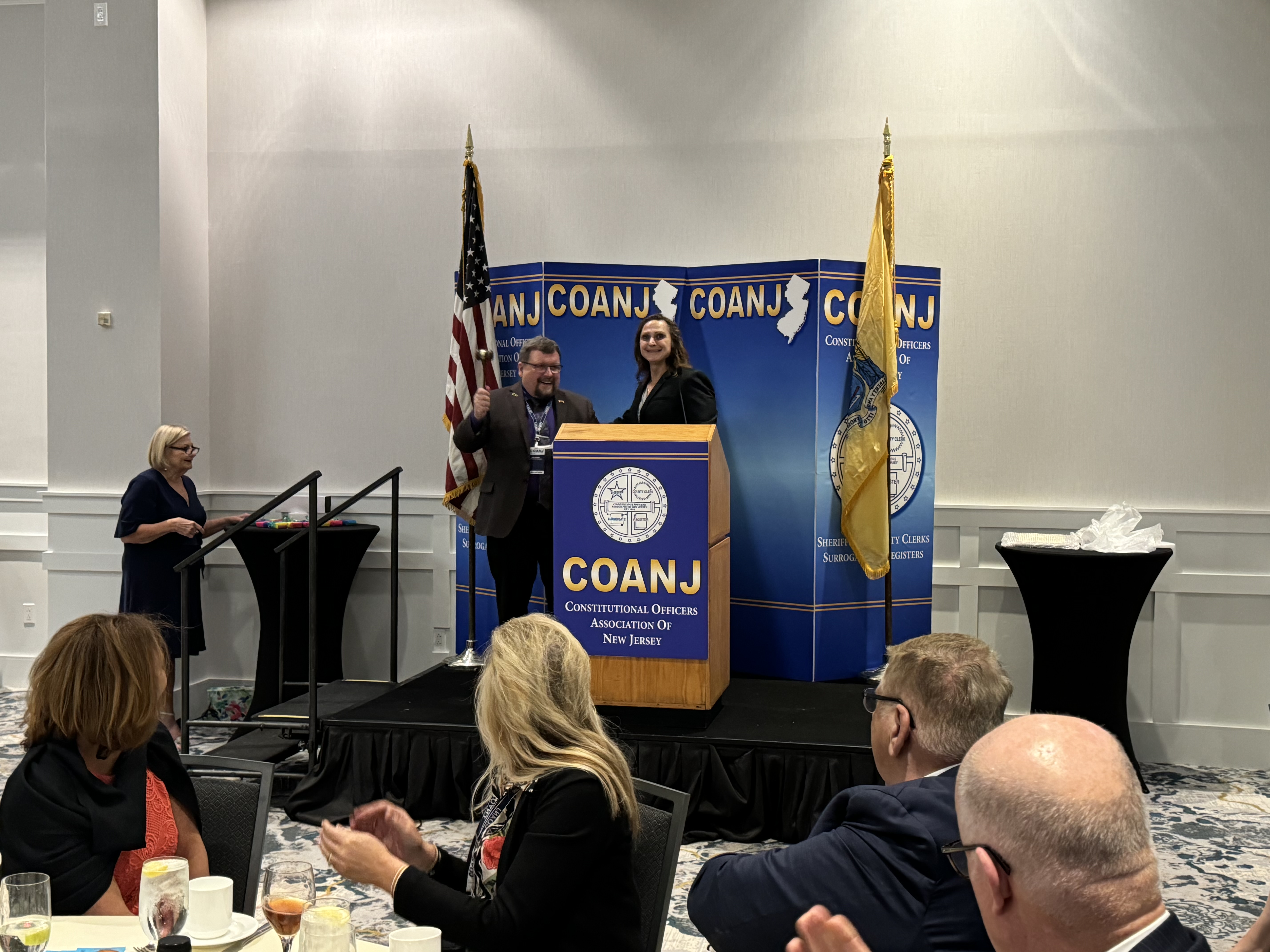 Surrogate Darling Giving the Gavel to New COANJ President Steve Peters
