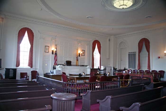 The back of courtroom #1, with original wooden pews