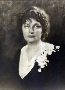 Mutchler in a black and white dress and white corsage