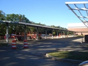 Work begins on installing elevated solar panels over more than 500 parking spaces at the William G. Mennen Sports Arena in Morris Township.