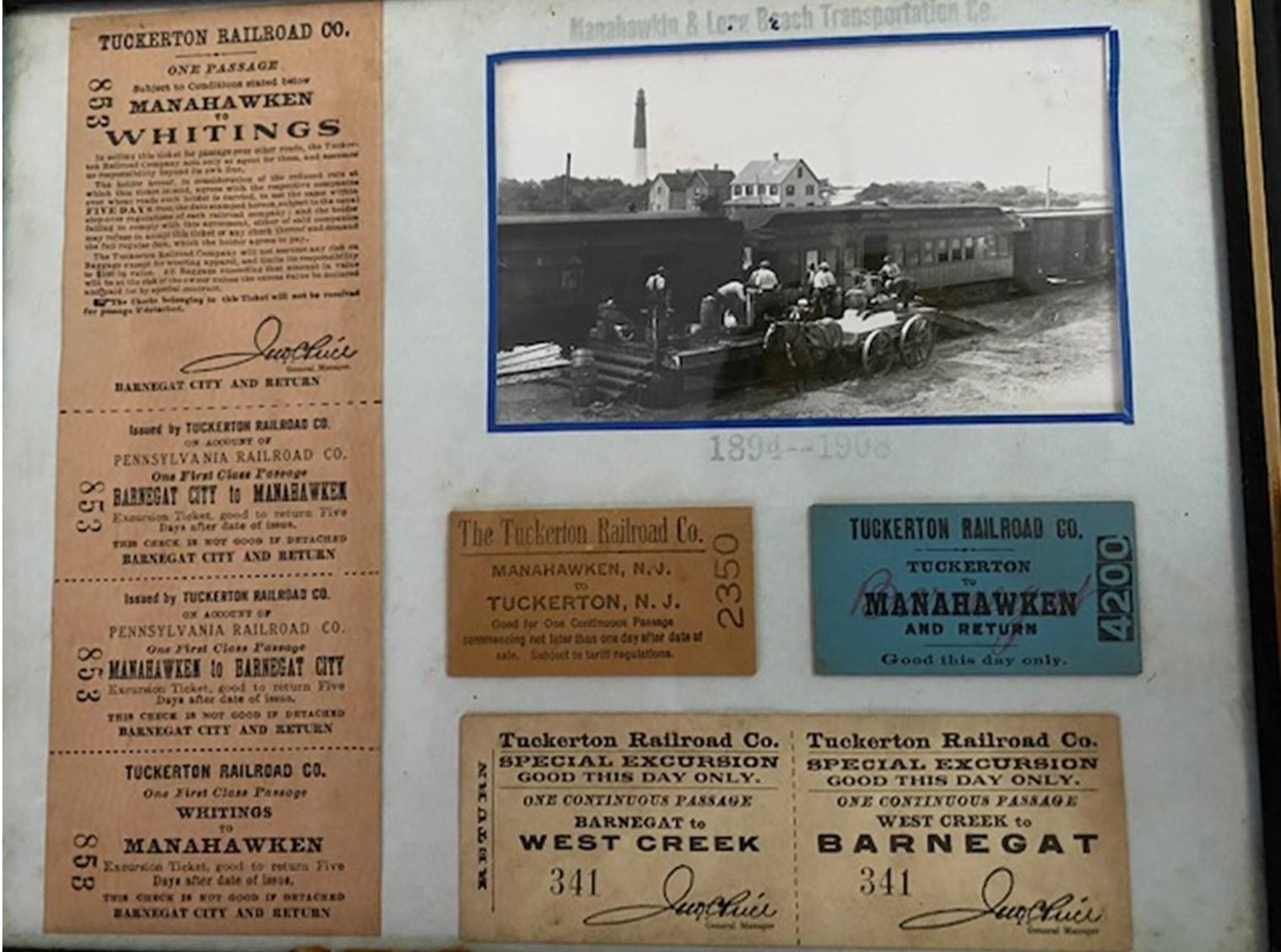 Tuckerton Railroad paraphernalia, including round trip tickets and workers loading fish onto a train.