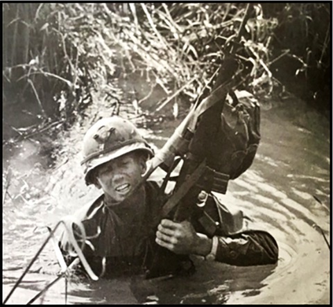 The 2nd Bn, 16th Infantry crossing a tributary of the Song Be River. 