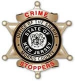CrimeStoppers logo, a seal on top of a six-pointed star