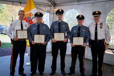 From L to R: Correctional Police Lieutenant Bileci, Correctional Police Officers Goodman, Sino, McCall, Sheriff Gannon
