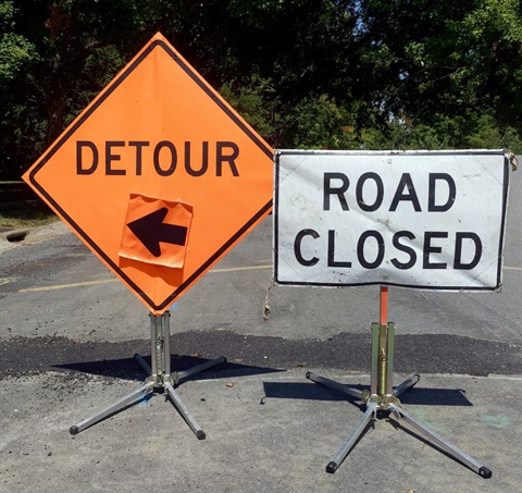 Detour and road closed signs