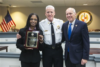 Sgt_Beverly_Downey_with Chief Ambrose and Commissioner Director Krickus