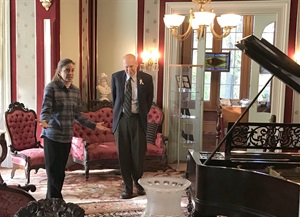 Historical society director with Commissioner Krickus in Acorn Hall
