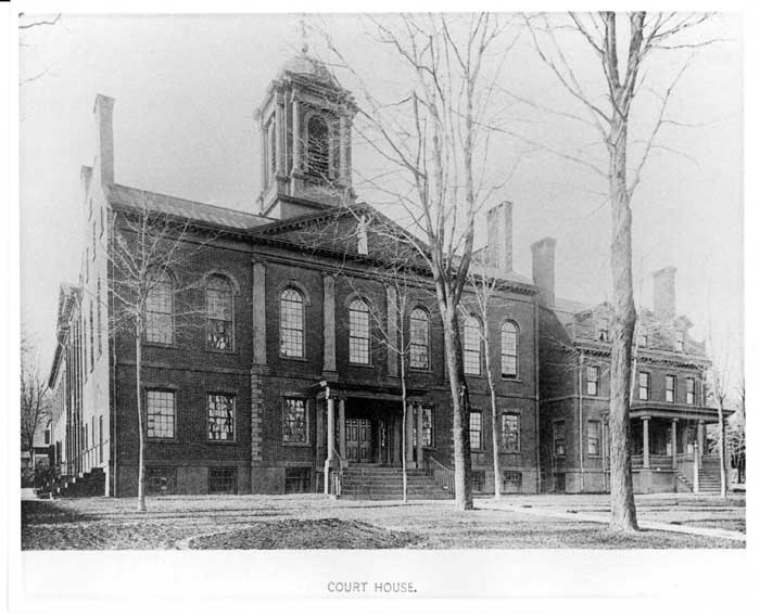 The courthouse is now next to the Sheriff's house, and the gray paint was removed