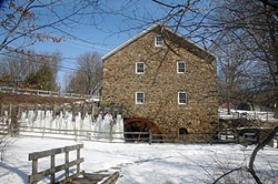 Exterior of Cooper Mill - the brick façade in the snow