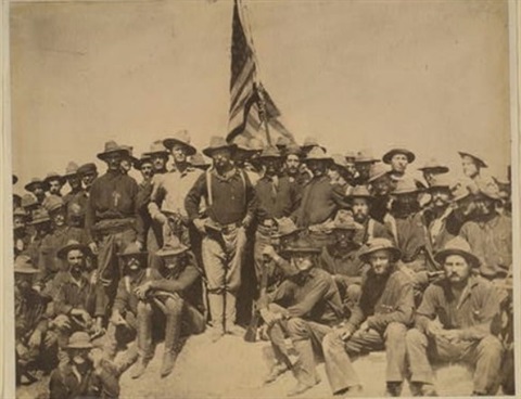 Theodore Roosevelt and his Rough Riders at the top of the hill they captured in the Battle of San Juan.