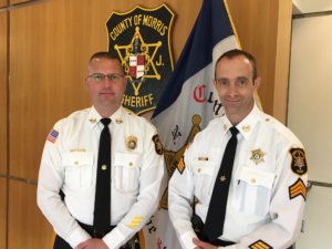 Morris County Sheriff's Office Bureau of Corrections Sergeant Andrew Bileci, R, will be honored by the charity Halos For Angels, Inc., for his help in making the charity flourish and assist families in need. Sgt. Bileci is pictured with Correctional Facility Warden Chris Klein.