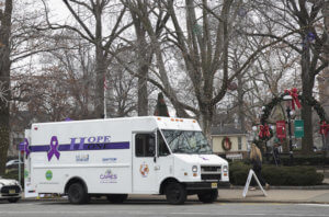 Hope One white and purple van on The Green