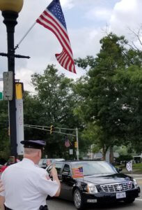 Morris County Sheriff James M. Gannon observes Vice President Mike Pence in his limousine pass through Morristown