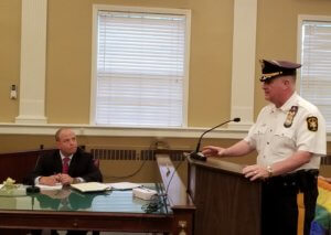 Morris County Sheriff James M. Gannon addresses the town of Dover mayor and board of aldermen on August 13, 2019, about efforts by his office and partner agencies to combat opioid addiction. 