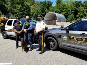 Boonton Township Police Chief Michael Danyo, Morris County Sheriff's Office K-9 Section Detective Marc Adamsky with K-9 Tim and Morris County Sheriff James M. Gannon 