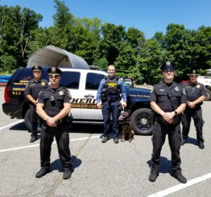 Front row: Boonton Township Police Sgt. Tom Cacciabeve and Officer Jody Becker. In back, Boonton Township Police Chief Michael Danyo, Morris County Sheriff's Office Detective Marc Adamsky with K-9 Partner Tim, and Boonton Township Lieutenant Andrew Tintle.