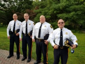 Morris County Sheriff's Office Bureau of Corrections Captain Steve Piatti, Correctional Facility Warden Chris Klein, Lieutenant Thomas Markey and Captain Joseph Fucci.