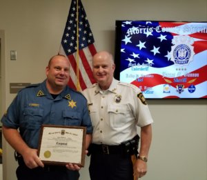 Morris County Sheriff James M. Gannon with Correctional Facility Corporal Jason Babbitt 