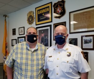 Morris County Sheriff James M. Gannon with Sheriff's Office Senior System Analyst Russell Moser.