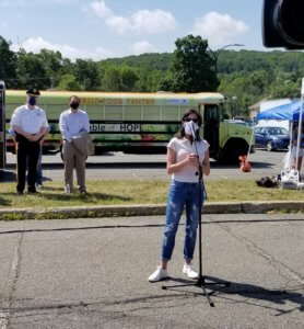 New Jersey First Lady Tammy Murphy speaks at the June 23 free food distribution to people in need hosted by Table of Hope Mobile Food Pantry and County College of Morris.