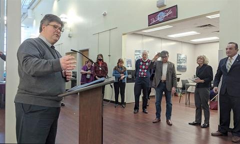 Library director Darren O'Neill speaks