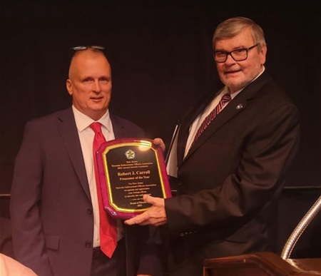 Carroll accepts honor
