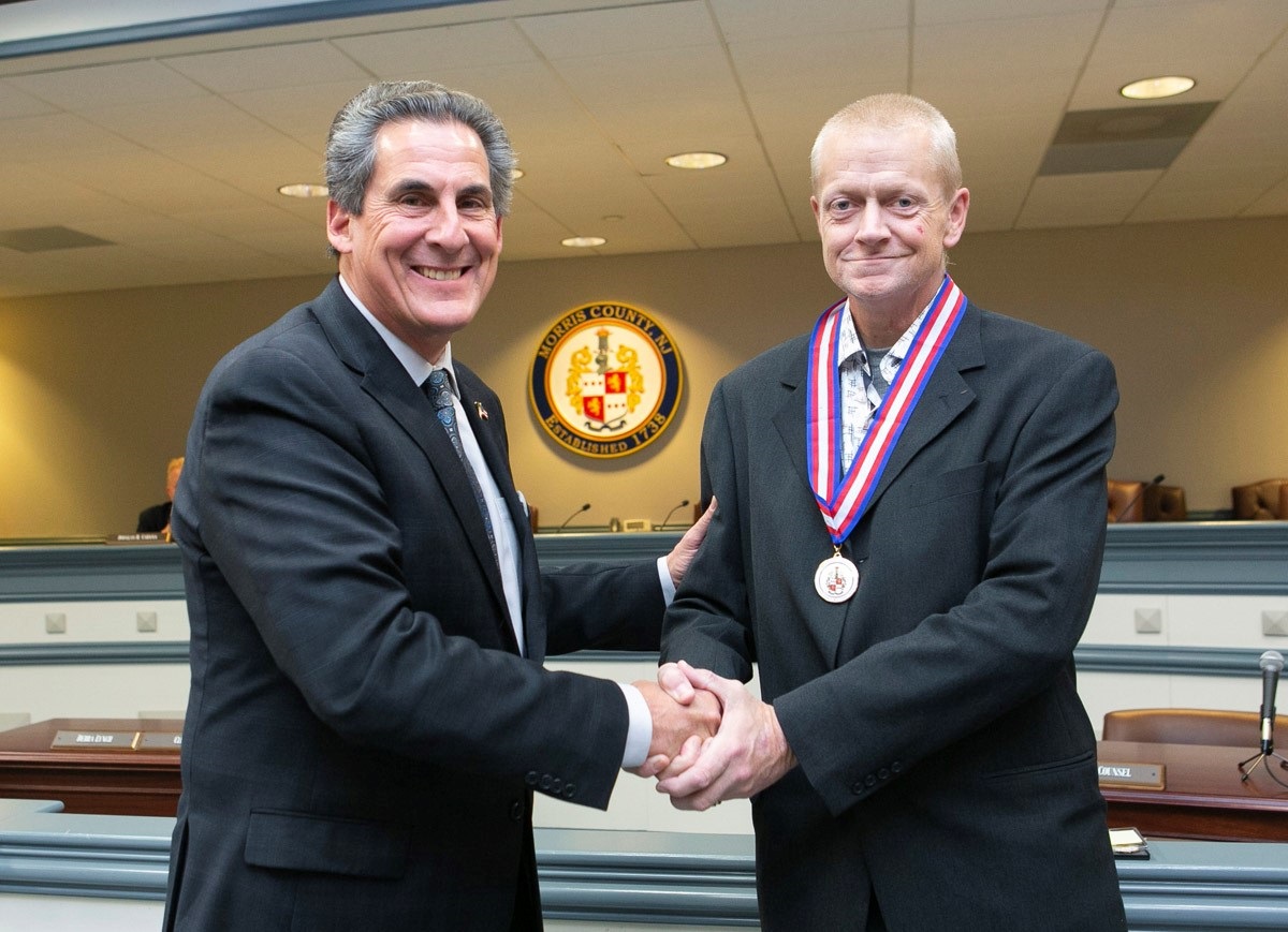 Joseph John McGovern Accepts Medal.jpg