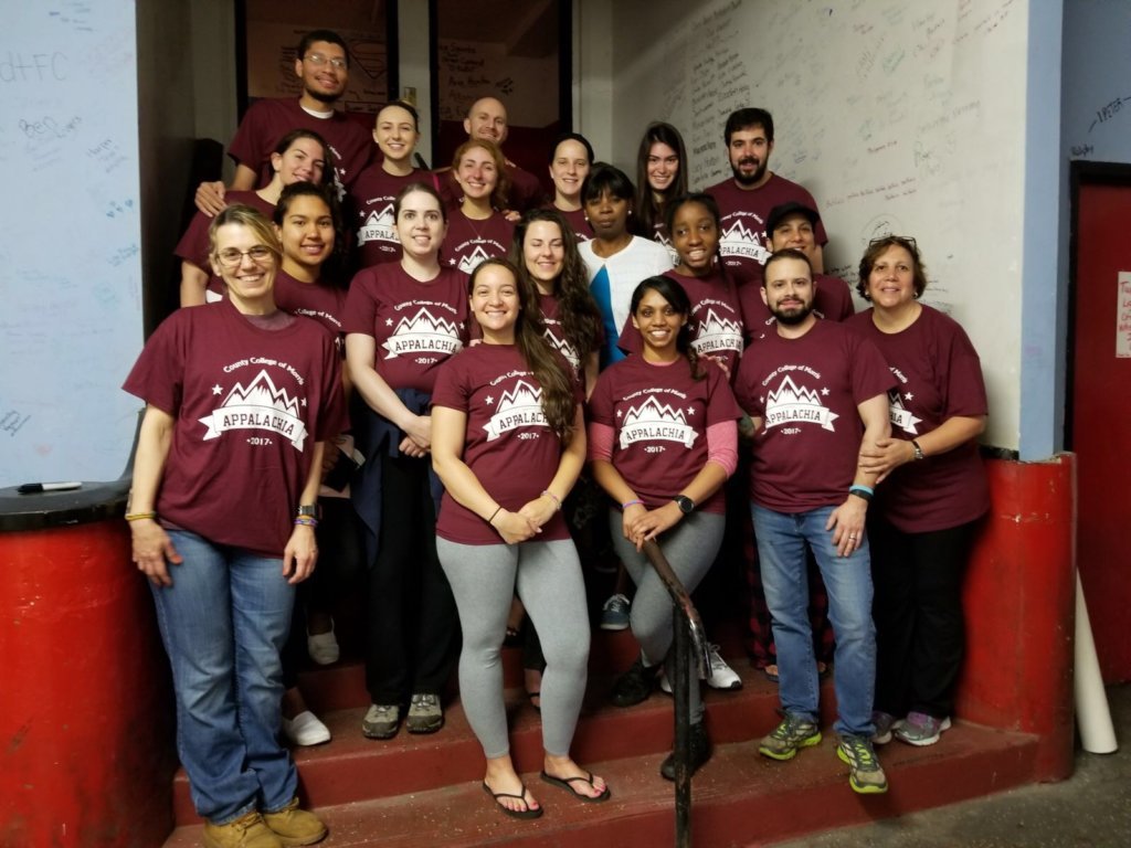 group photo of participating students and professors
