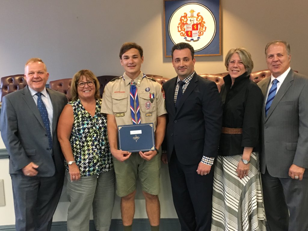 photo of (l/r) Freeholders Doug Cabana and Kathy DeFillippo, Scout Ben Smith, and Freeholders John Cesaro, Deborah Smith and Tom Mastrangelo