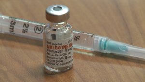 vial of naloxone (generic of Narcan) with a syringe