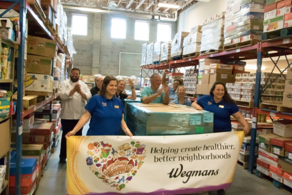 Photo of the Interfaith Pantry volunteers and Wegman's team at the Pantry on June 15 