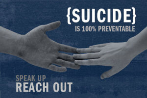 Suicide is Preventable poster showing two hands reaching for each other