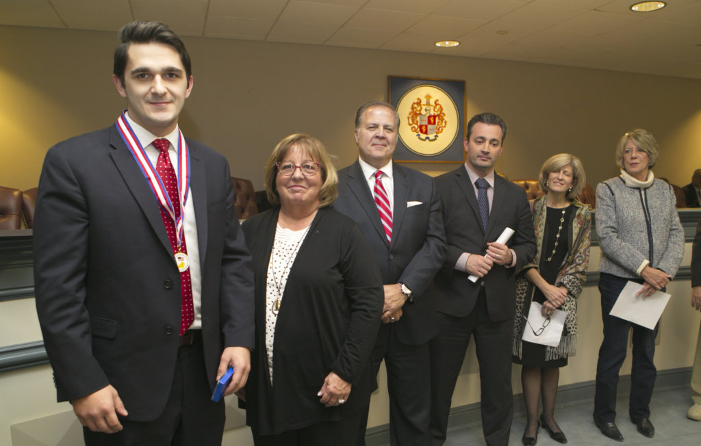 photot of (l/r) Veteran Andrew Lachawiec of Morristown and Freeholders Kathy DeFillippo, Tom Mastrangelo, John Cesaro, Christine Myers and Deborah Smith