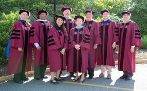 photo of the County College of Morris Board of Trustees, wearing caps and gowns