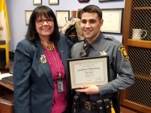 photo of County Clerk Ann Grossi with post-contest officer Philip Deluca