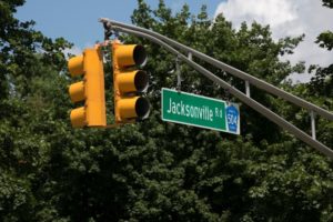 Jacksonville Road sign and traffic light