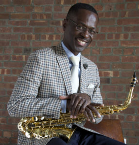 Mark Gross holding his sax