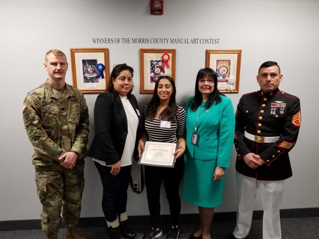 First place winner Krystal Colon with her mom, County Clerk Grossi, Picatinny Commander Morgan and her Marine Corps recruiter 