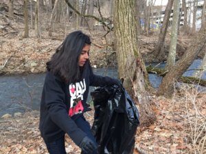 Explorer Post 140 member Vani Gupta collected litter with fellow Explorers at the annual Whippany River clean-up