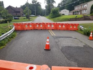 photo shows a Section of Intervale Road closed due to a culvert failure