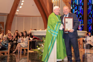 Monsignor Carroll with Freeholder Director Doug Cabana