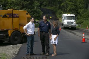 Freeholder Stephen Shaw joins Chester Township Mayor Marcia Asdal and Councilman Michael Inganamort on North Road last week