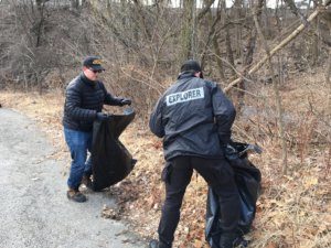 Sheriff's Explorers Chris Primamore, left, and Steven Fasano, help beautify the banks and surrounding area of the Whippany River