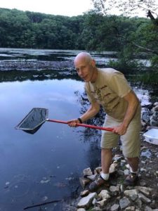 Naturalist Peter Hoffman exploring a waterway